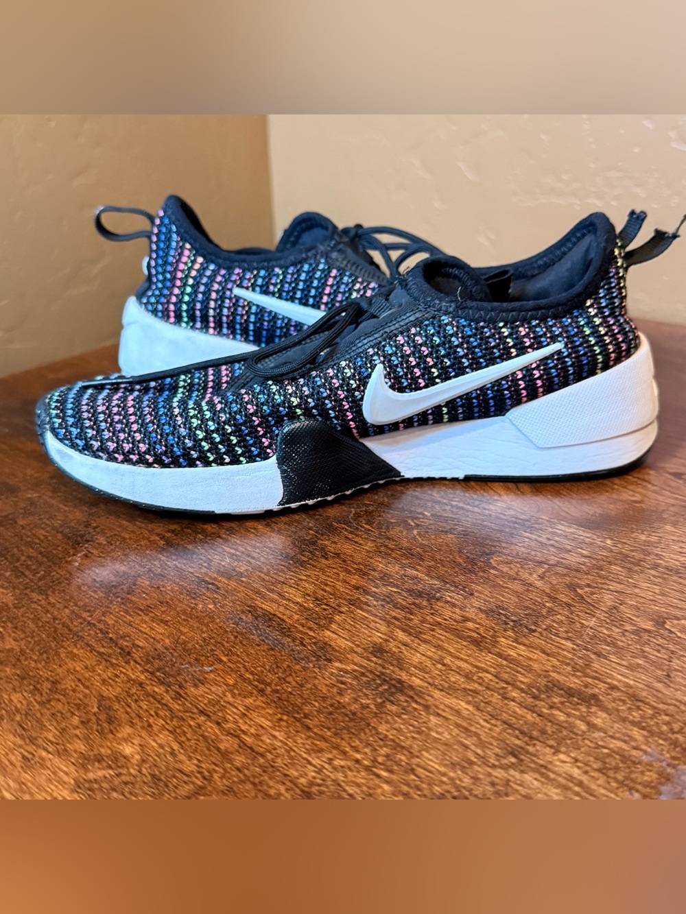 Nike Kids Black Knit Sneakers with Rainbow Stitching and White Swoosh